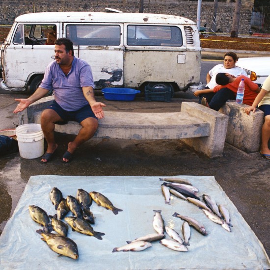 Man selling fish on the Corniche 